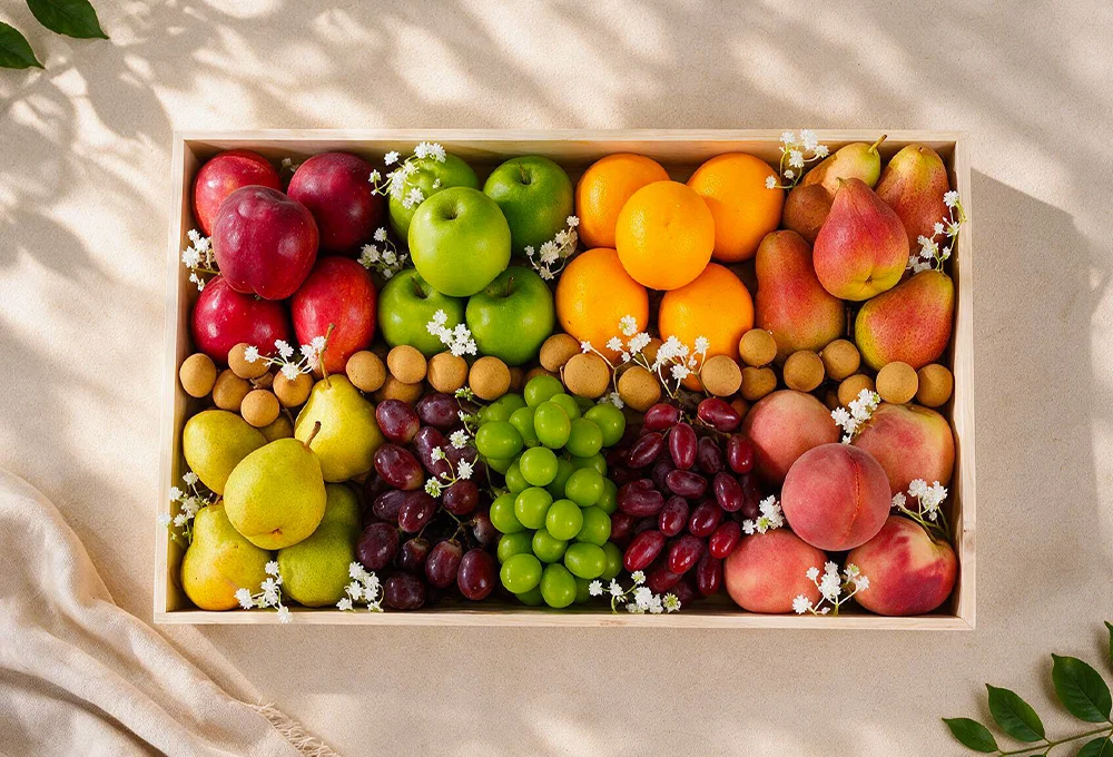 Washington Apple, Green Apple, Valencia Orange, Red Beauty Pear, Green Vermont Pear, Red Globe Grape, Green Muscat Grape, Red Seedless Grape, Spanish Peach, and Longan in a Premium Wooden Tray.