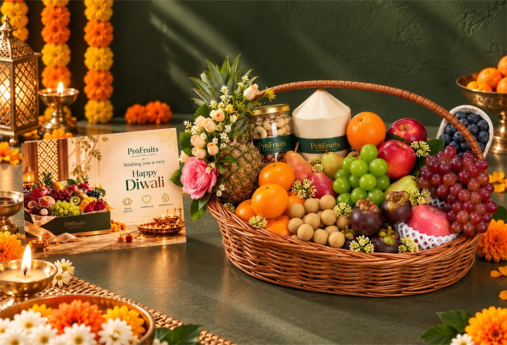 Longan, Mangosteen, Murcott Orange, Red Beauty Pear, Green Vermont Pear, Valencia Orange, Rockit Apple, Green Muscat Grapes, Red Seedless Grapes, Fuji Apple, Thai Coconut, Whole Honey Pineapple, and Blueberries with a Handle Basket & Happy Diwali Greeting Card.