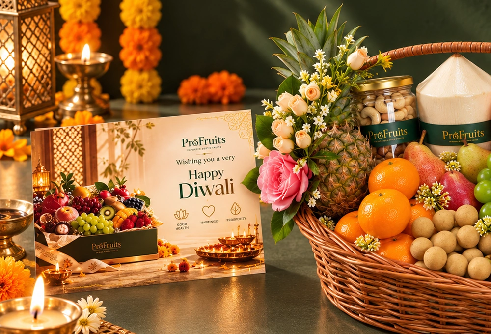 Longan, Mangosteen, Murcott Orange, Red Beauty Pear, Green Vermont Pear, Valencia Orange, Rockit Apple, Green Muscat Grapes, Red Seedless Grapes, Fuji Apple, Thai Coconut, Whole Honey Pineapple, and Blueberries with a Handle Basket & Happy Diwali Greeting Card.