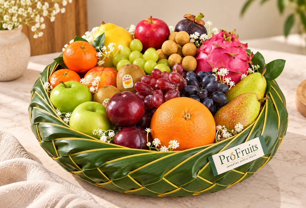 Premium leaf basket with Black Grapes, Red Seedless Grapes, Egypt Mango, Kutch Dragon Fruit, Mangosteen, Kiwi, Apples and exotic imported fruits