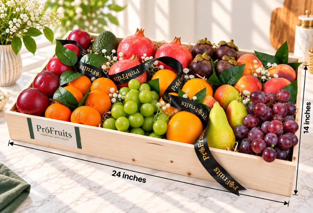 Premium exotic fruit hamper with Rockit apples, Valencia oranges, mandarins, Hass avocado, Red Globe grapes, Green Muscat grapes, mangosteens, XL pomegranate, Red Beauty pears and Spanish yellow peaches in a wooden crate